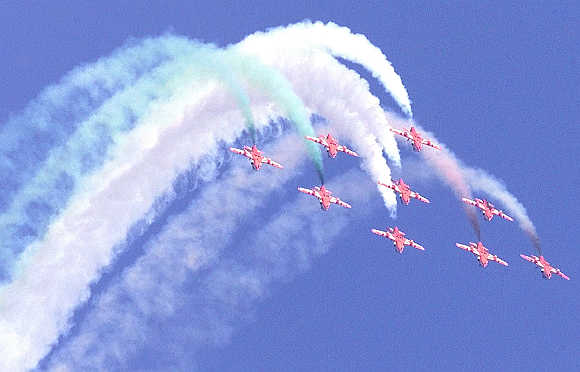 Indian Air Force pilots perform during an air show in Baroda.
