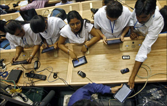 Students with Aakash Tablet.