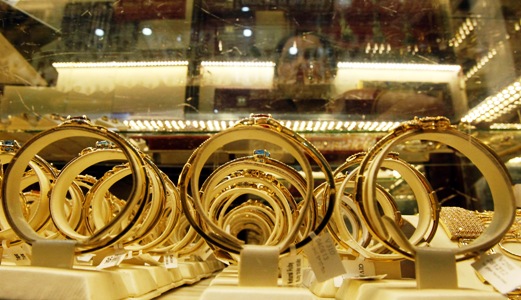 Gold products on sale are displayed at a shop in Hanoi.