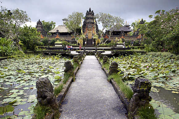 Pura Taman Saraswati temple, devoted to Dewi Saraswati, the goddess of learning, literature and the arts, is framed in lotus ponds in central Ubud, in Bali.