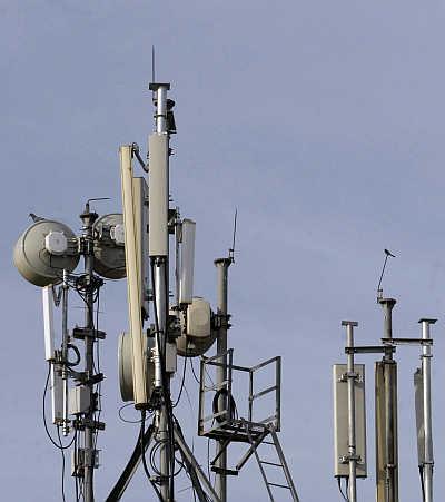 Birds sit atop telecommunication towers in Hyderabad.