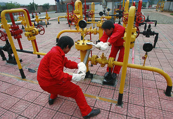 Labourers work at a PetroChina refinery in Suining, southwest China's Sichuan province. Photo is for representation purpose only.