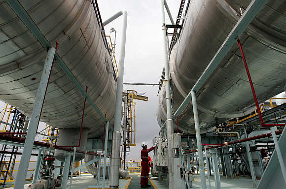 Oil worker Denis Pena conducts operations at the Main Production Platform Urdaneta in the middle of Lake Maracaibo, about 65km from Maracaibo City, in Venezuela. Photo is for representation purpose only.