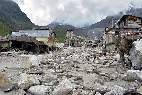 The Kedarnath Temple (C) is pictured amid damaged surroundings by flood waters at Rudraprayag in Uttarakhand.