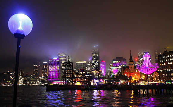 Some of the buildings of Sydney skyline are lighted up in pink as part of the Vivid Festival, in Australia.