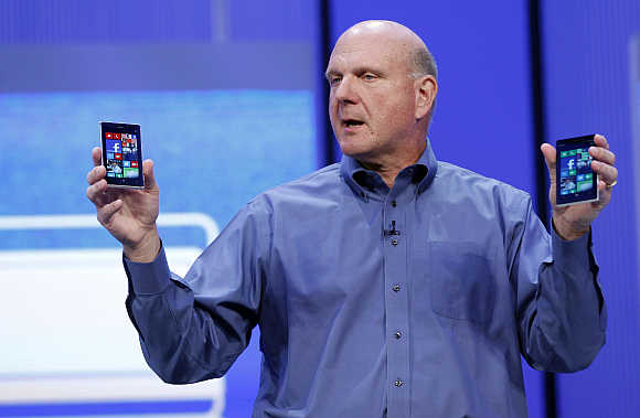 Steve Ballmer displays Windows phones during his keynote address at the Microsoft 'Build' conference in San Francisco, California.