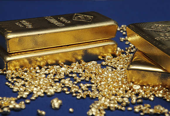 Gold bars and granules are pictured at the Austrian Gold and Silver Separating Plant 'Oegussa' in Vienna.