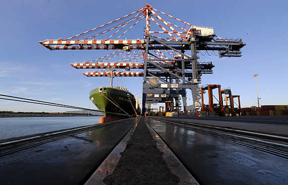 A container ship and cranes at Italy's biggest port Gioia Tauro in the southern region of Calabria.