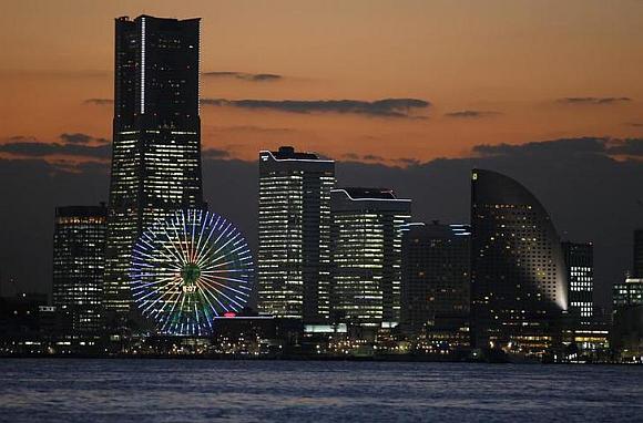 The sun sets in Yokohama, south of Tokyo.