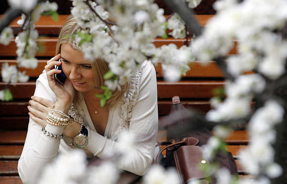 A woman speaks on the phone at a department store in Moscow.
