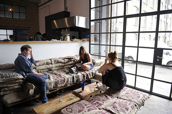 Customers at the White Building, a restaurant and studio space in Hackney Wick, London, United Kingdom.