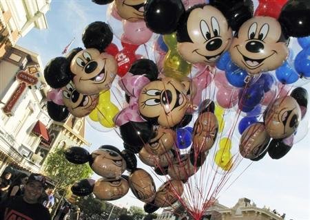 Balloons of Mickey Mouse are carried down main street at Disneyland in Anaheim, California.