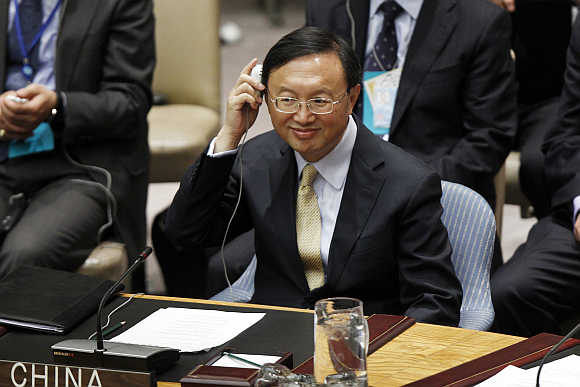 China's Foreign Minister Yang Jiechi listens to translations as he participates in a Security Council meeting in New York.