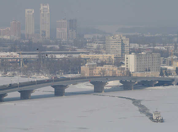 An icebreaker sails along a river in Kiev, Ukraine.