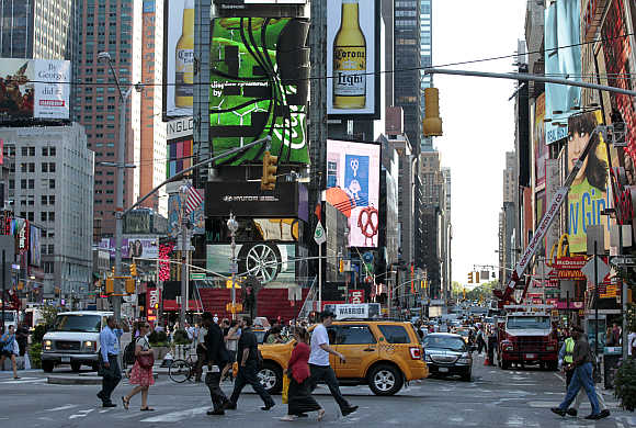 Morning commuters make their way through Times Square in New York City, United States.
