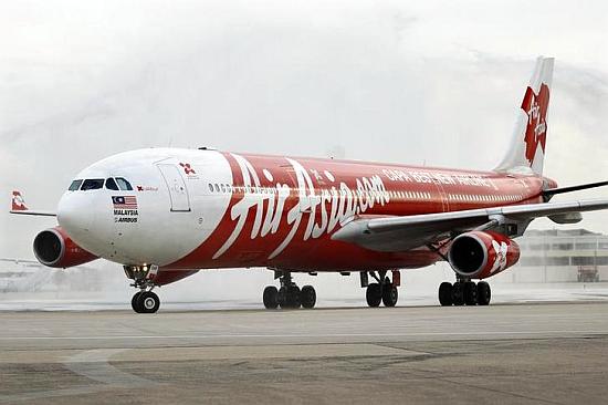An Airbus A340 AirAsia X passenger jet arrives on its inaugural flight from Kuala Lumpur to Paris.