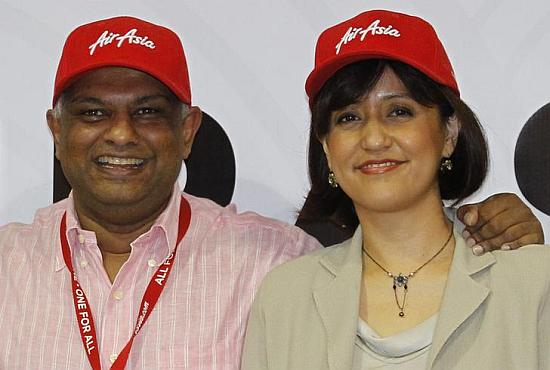 Newly appointed AirAsia's Chief Executive Officer of Malaysian Operations Aireen Omar (R) and Group CEO Tony Fernandes.
