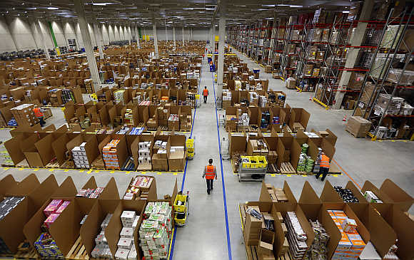 Work is carried out at Amazon's logistics centre in Graben near Augsburg, Germany.