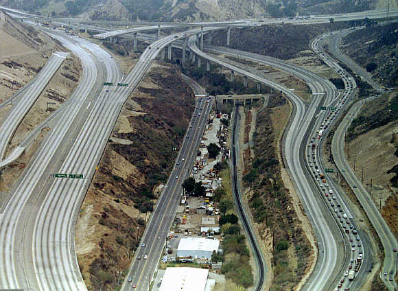 A view of the intersection of the Interstate 5 and 14 freeways, after the Northridge earthquake caused major damage to an overpass (upper left) in the United States.