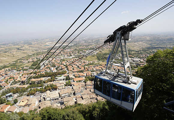 A gondola ascends Monte Titano to the old city of San Marino.