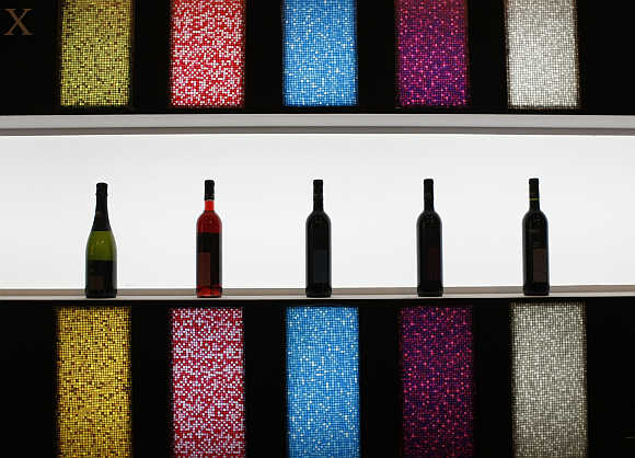 Wine bottles are displayed at Alimentaria trade show in Barcelona, Spain.