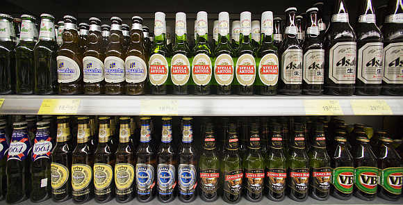Bottles of beer are displayed for sale at a store in Hong Kong's Sheung Wan district.