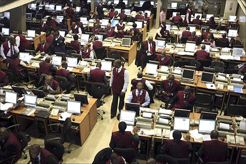 Brokers work on the trading floor of the Nigerian stock exchange in the commercial capital Lagos.