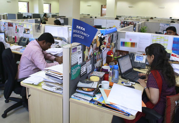 TCS employees at work. 