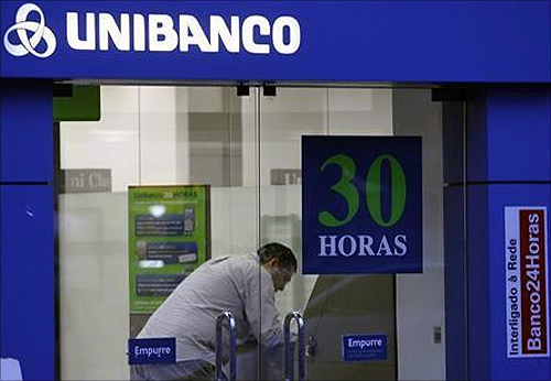 A customer is seen inside the Unibanco bank branch in Rio de Janeiro.