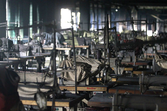 The interior of a garment factory is seen after a fire.