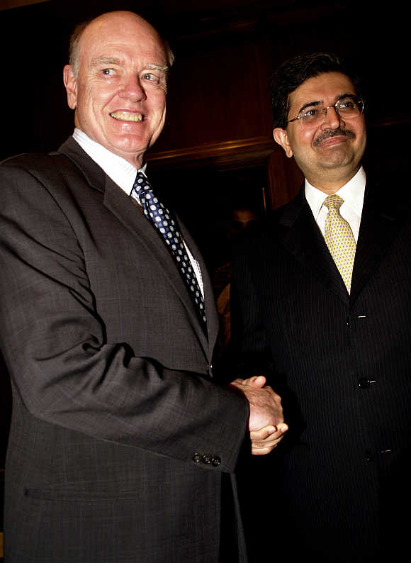 Uday Kotak with former US Treasury Secretary John Snow in Mumbai.