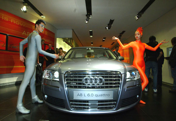 Chinese models perform at the unveiling of Audi twelve-cylinder A8.