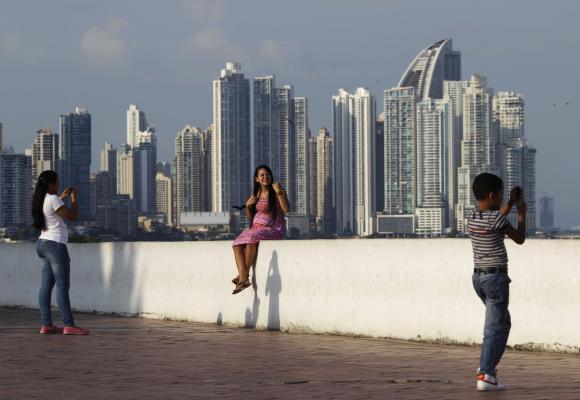 People are seen in Plaza de Francia in Panama City.