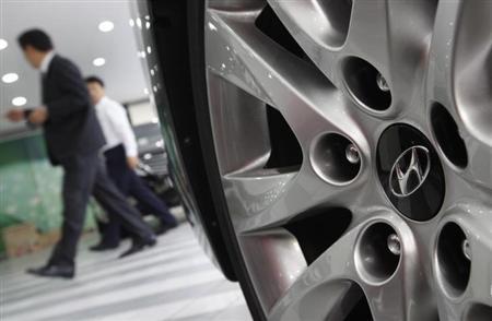 The logo of Hyundai Motor is seen on the wheel of a car at a Hyundai dealership in Seoul.