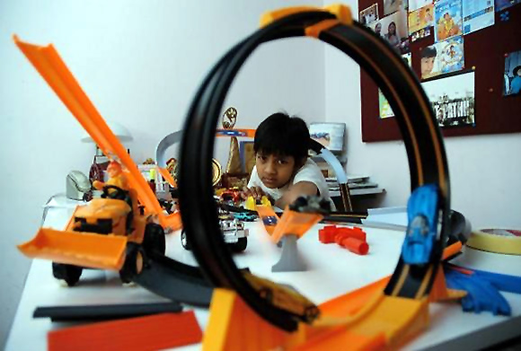 Kishan S.S. plays with toys at home in Bengaluru.