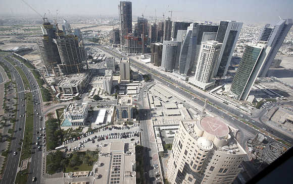 A view of Doha with buildings under construction in Qatar.