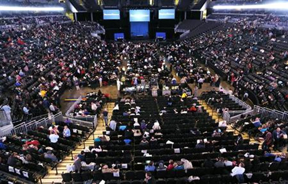 Berkshire Hathaway shareholders wait in the CenturyLink arena for the second session to begin at the company's annual meeting in Omaha.