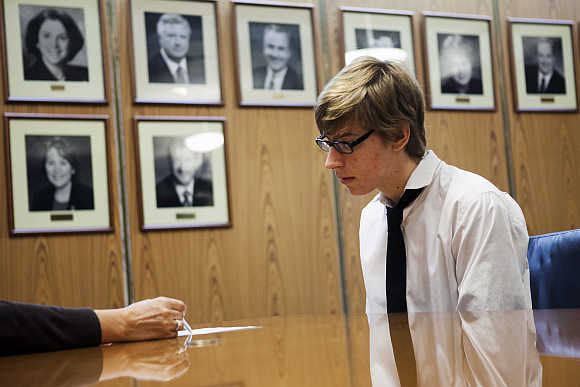 Student Miles Spencer, 17, receives feedback on his resume during an interview as part of work readiness training at the Los Angeles Area Chamber of Commerce in California.