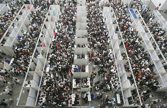 Thousands of job seekers flock to a fair in Chongqing municipality, China.