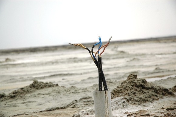 Wires from houses are taken till lake bed to pump water.