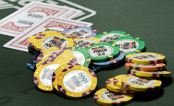 Chips and cards are shown on a poker table during the World Series of Poker no-limit Texas Hold 'em main event at the Rio hotel-casino in Las Vegas, Nevada, United States.