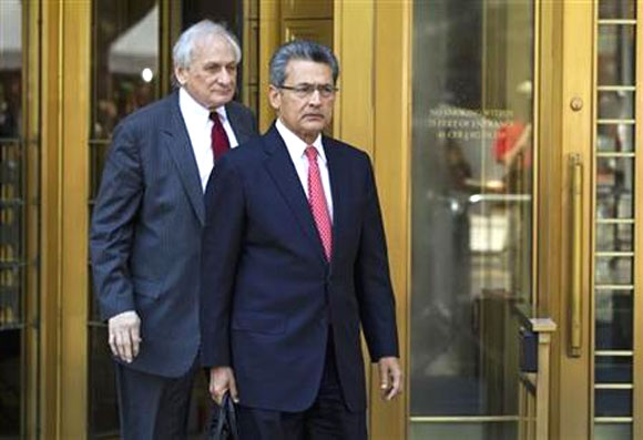 Former Goldman Sachs Group Inc board member Rajat Gupta (R) leaves Manhattan Federal Court with his lawyer, Gary Naftalis, following a guilty verdict in New York June 15, 2012.