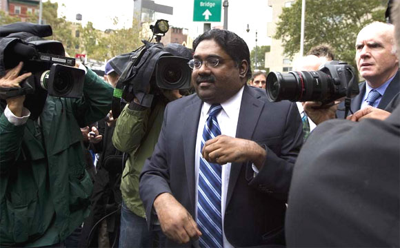 Galleon hedge fund founder Raj Rajaratnam departs Manhattan Federal Court after his sentencing in New York October 13, 2011.