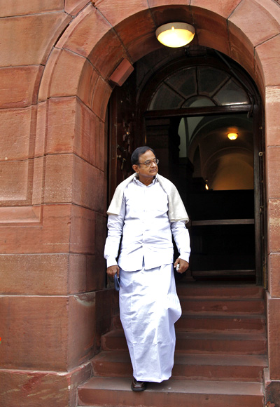 P Chidambaram comes out of the parliament after attending the first day of the budget session in New Delhi.