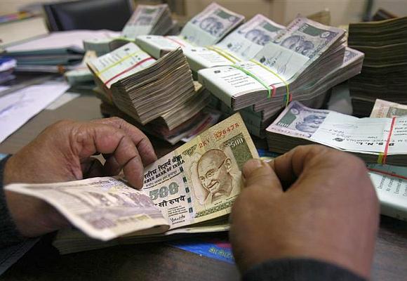 Markets end lower on high CAD, weak rupee