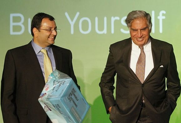 Ratan Tata (R) and Tata Group Chairman Cyrus Mistry attend the launch of a new website for tech superstore Croma in Mumbai.
