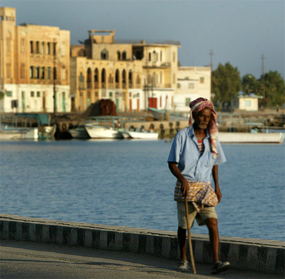 An Eritrean man walks alongside the Red Sea port of Massawa, 150km from the capital of Asmara.