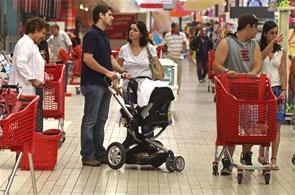 People shop at a supermarket in Lisbon.