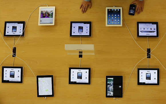 Apple's iPad devices are displayed at its store in Tokyo.