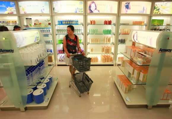 A woman shops inside Amway's sales showroom.